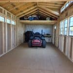 shed interior loft workbench pegboard mower